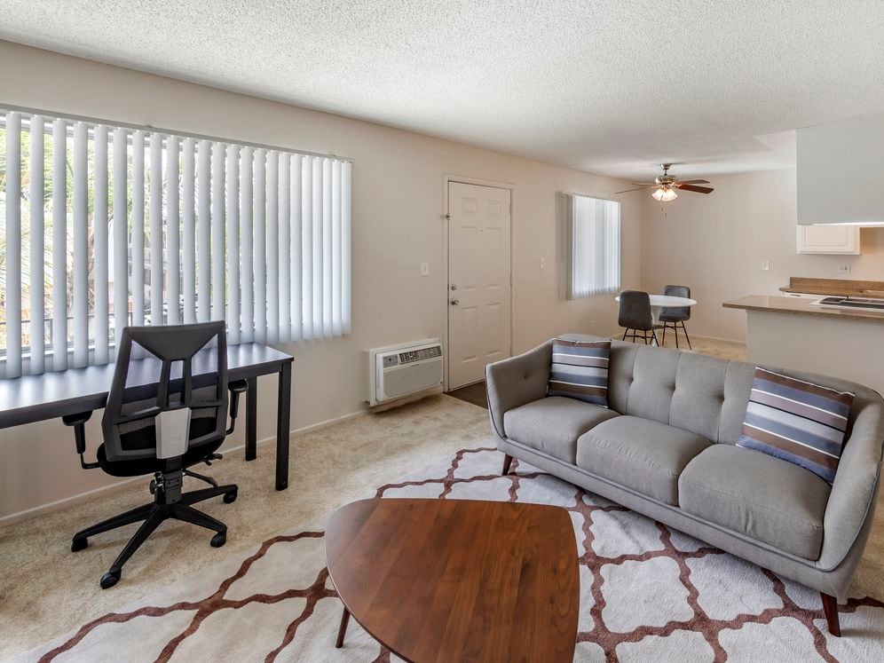 Furnished+ apartment homes include a dining set (Representative Image – exact items and style of furnishings may vary)