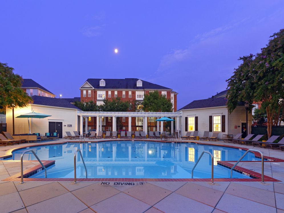 Courtyard with swimming pool, sundeck with lounge seating