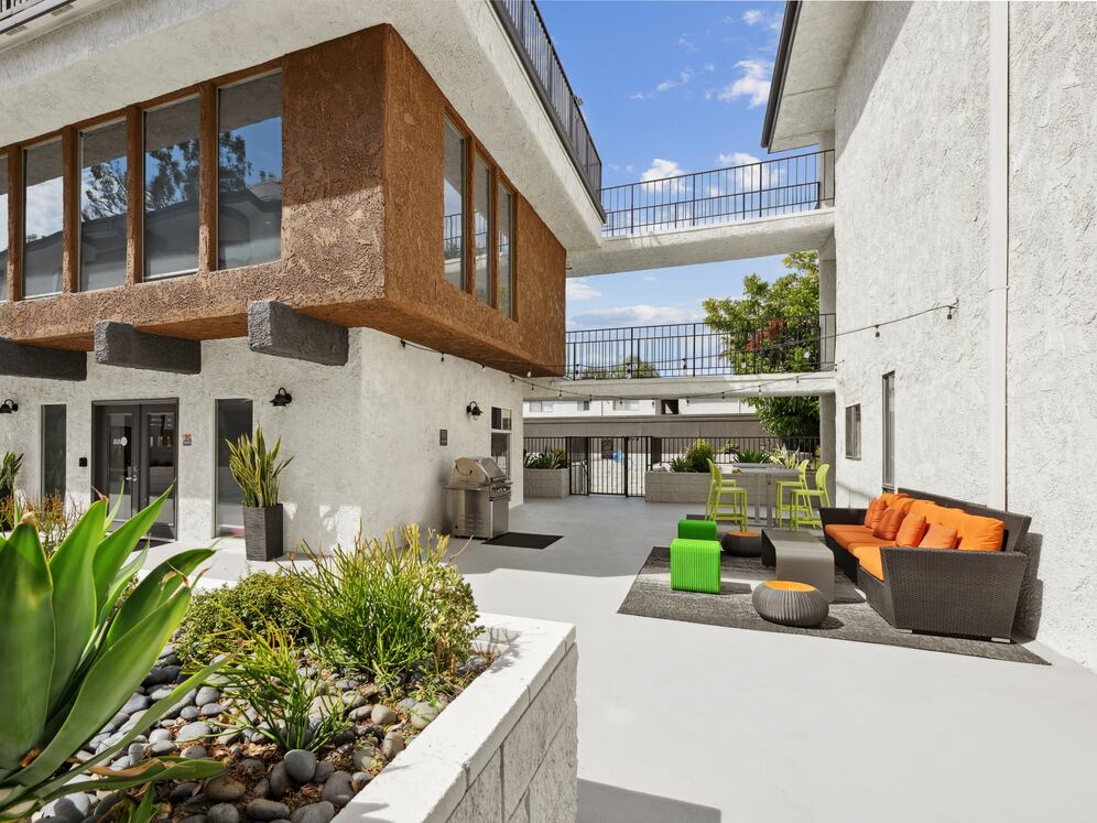 Courtyard with BBQ grills and lounge seating