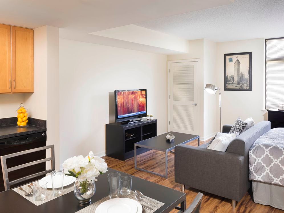 Dining and living area with hard surface flooring