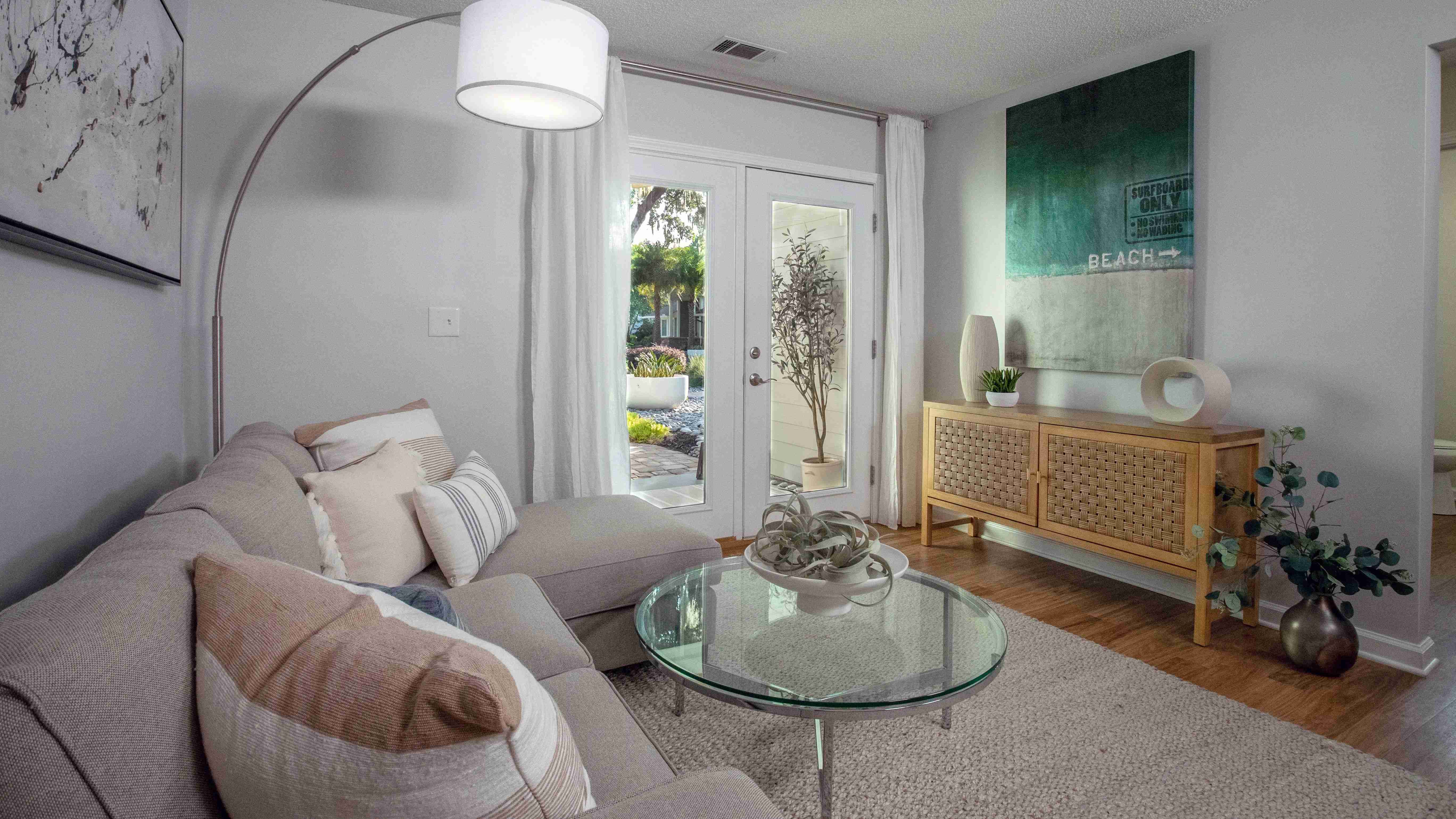 Embrace upscale living in our bright, spacious living rooms with French doors, inviting you to extend your living space to a private screened-in patio or balcony. 