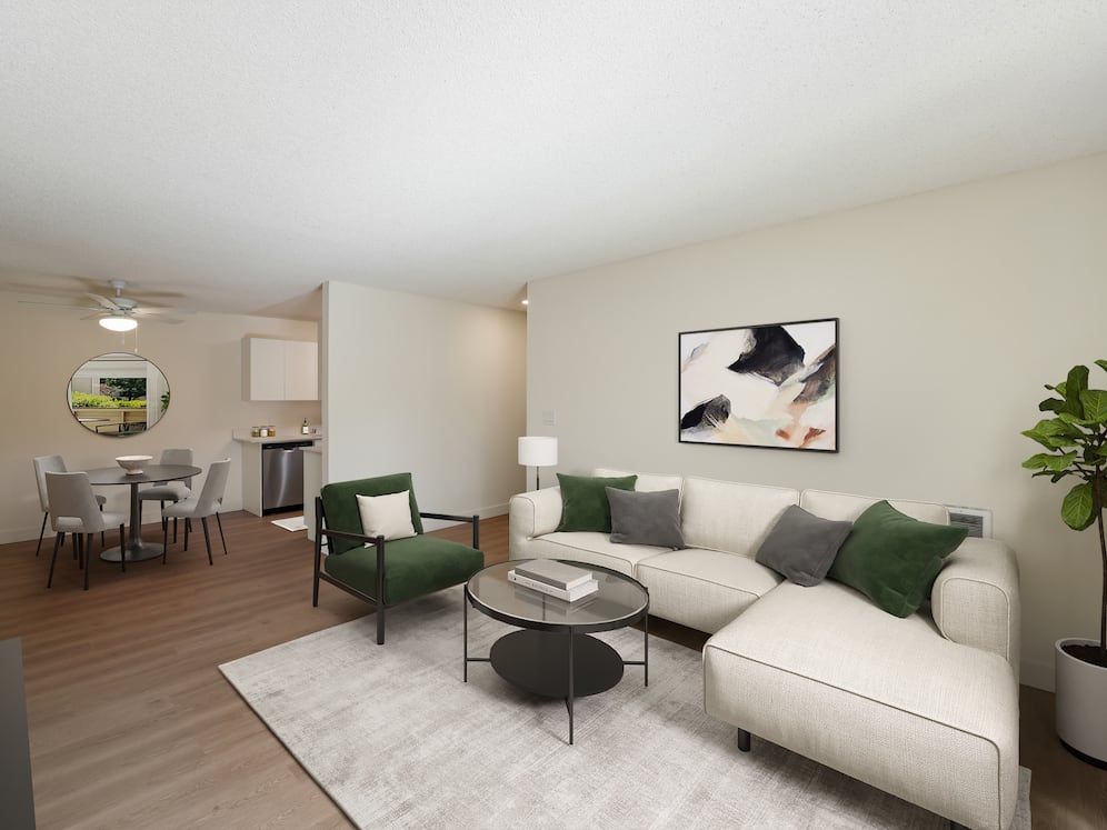 Renovated Package II dining and living room with hard surface flooring