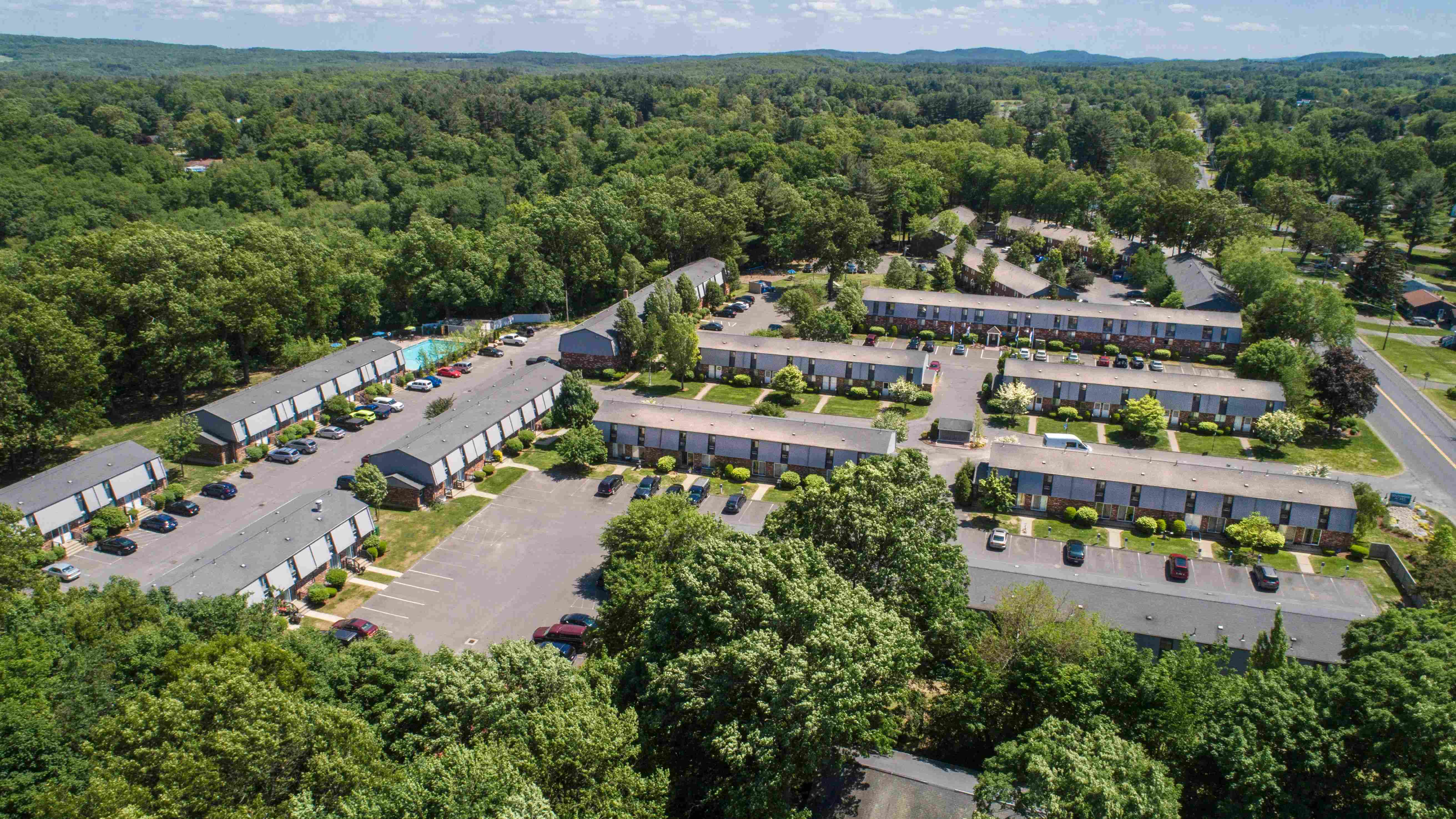 Discover Southwood Acres from a bird's eye view, a serene and private community nestled amid lush trees. Welcome home to nature's embrace.