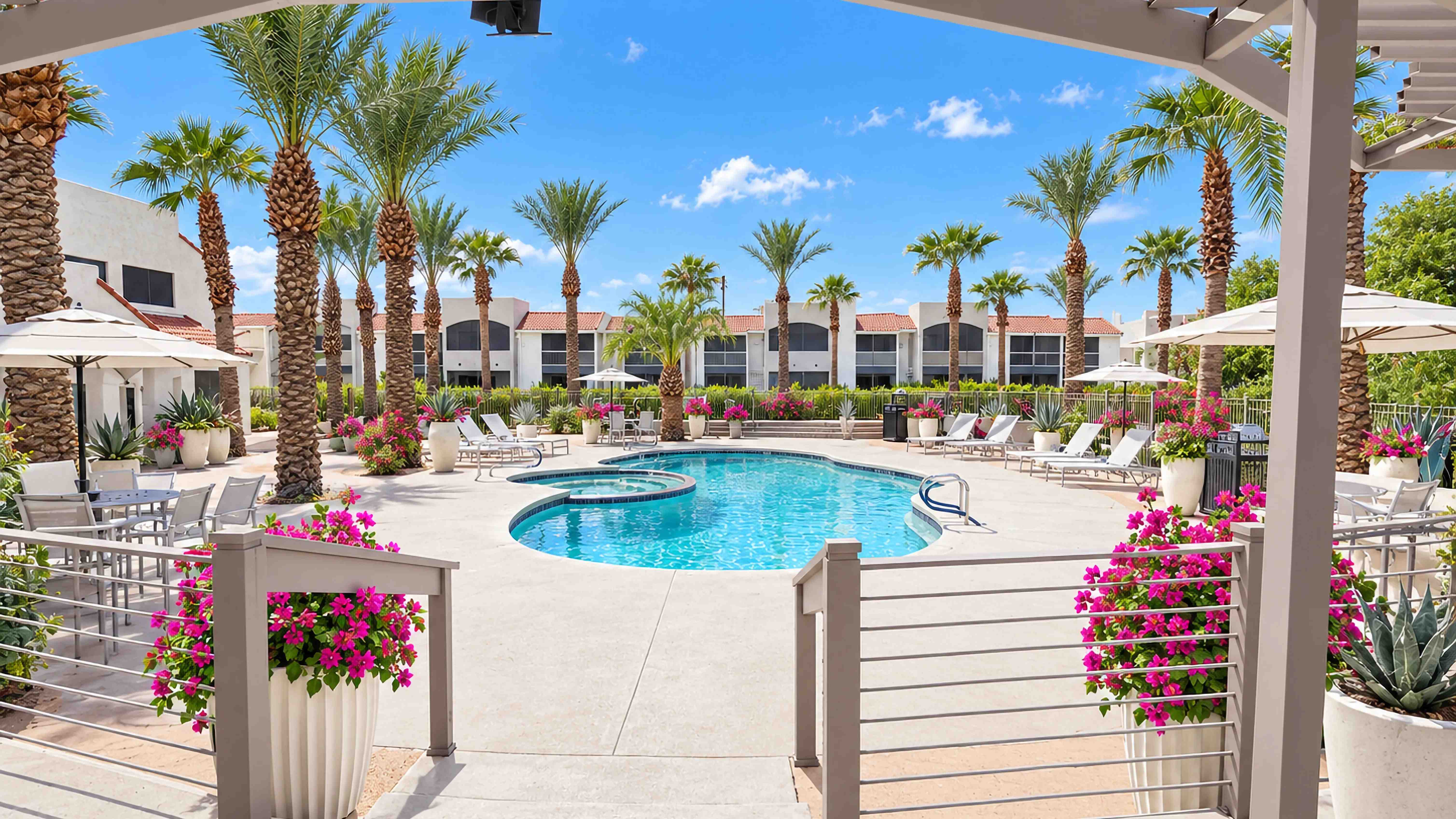 Relax, recharge, and enjoy outdoor living at Level 550. A sparkling pool and spa, spacious sundeck, shaded seating, and palm-lined surroundings create an ideal setting for outdoor relaxation.