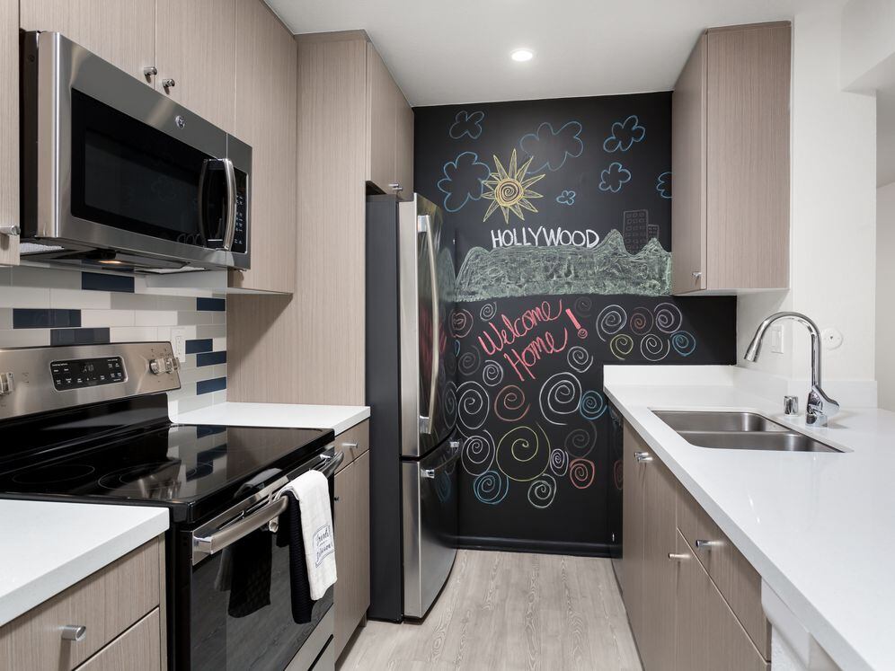 Design Package III Kitchen with hard surface flooring stainless steel appliances