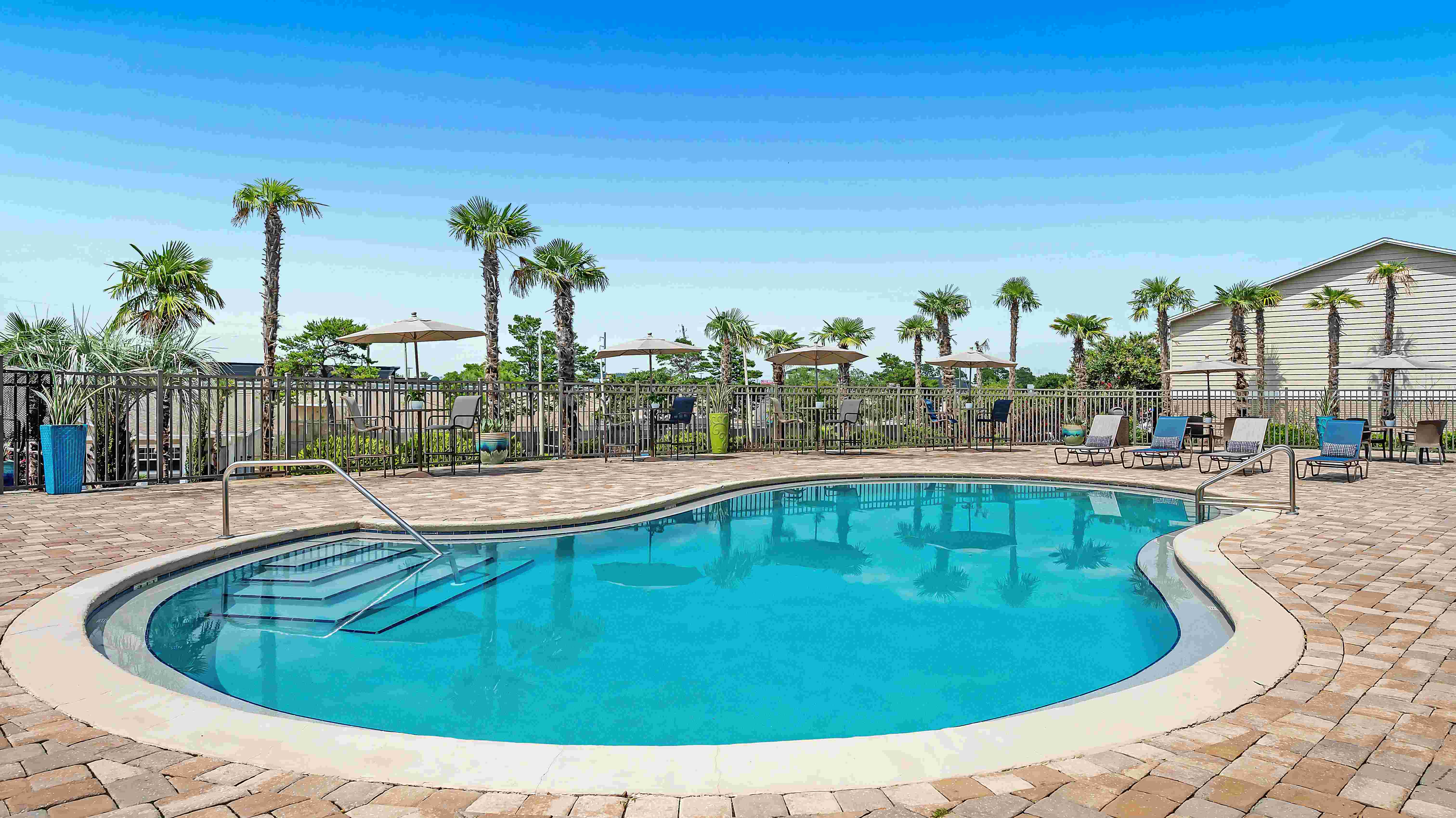 Savor tranquility every day at our luxurious resort-style pool, an oasis to beat the Florida heat and bask in serenity.