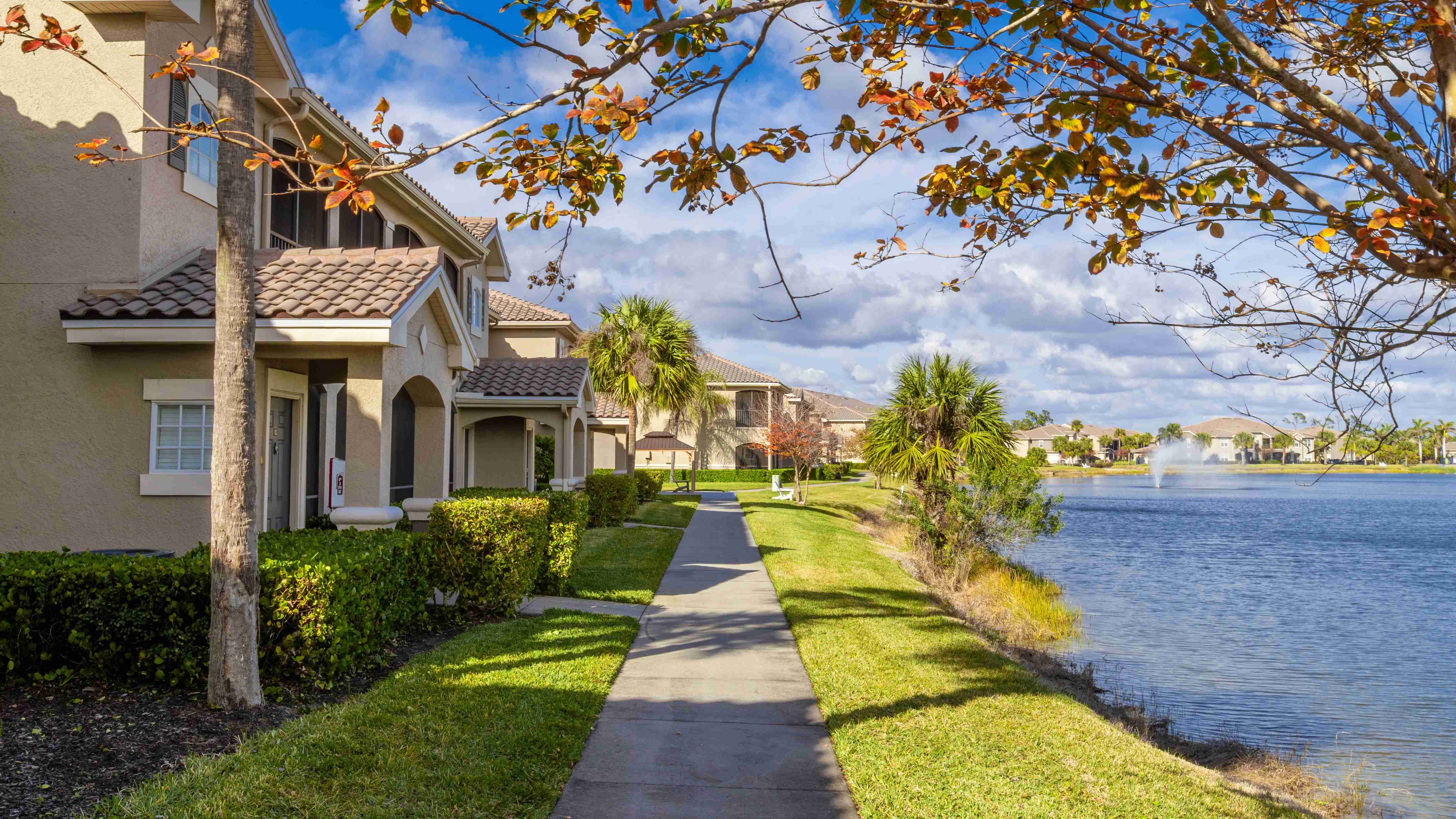 Stroll along peaceful lakeside walking paths surrounded by lush greenery and breathtaking water views.