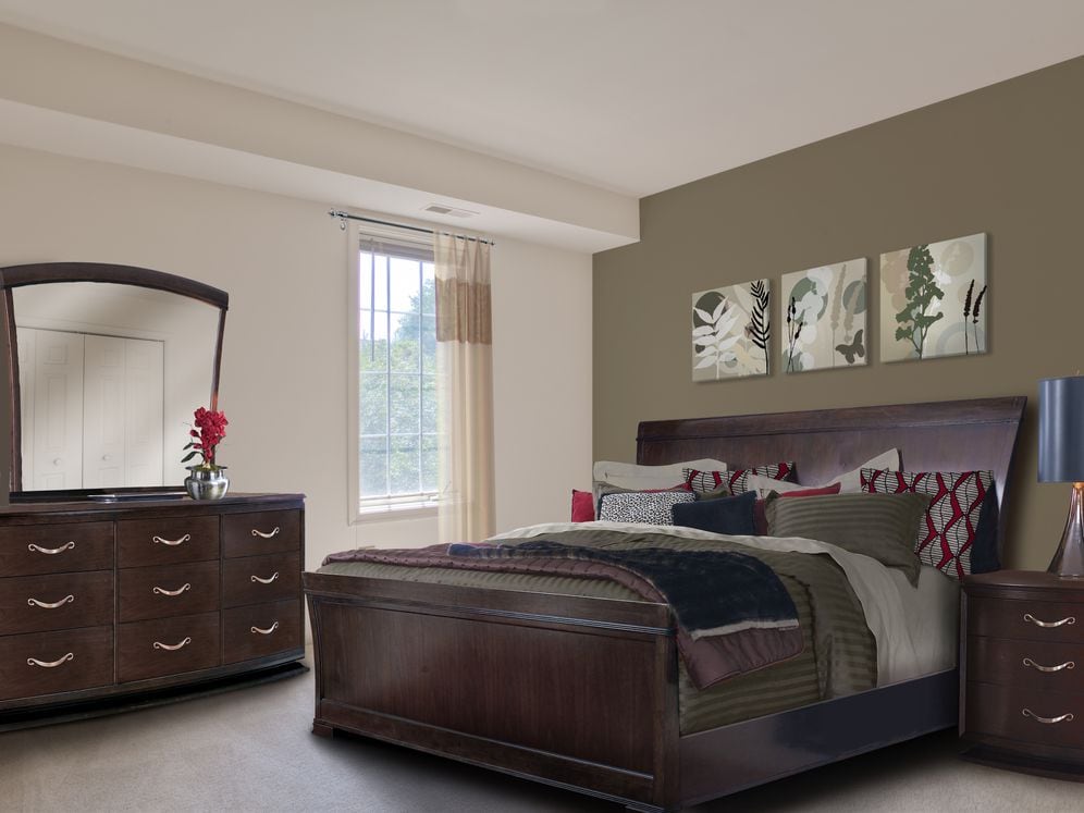 Carpeted bedroom with accent wall