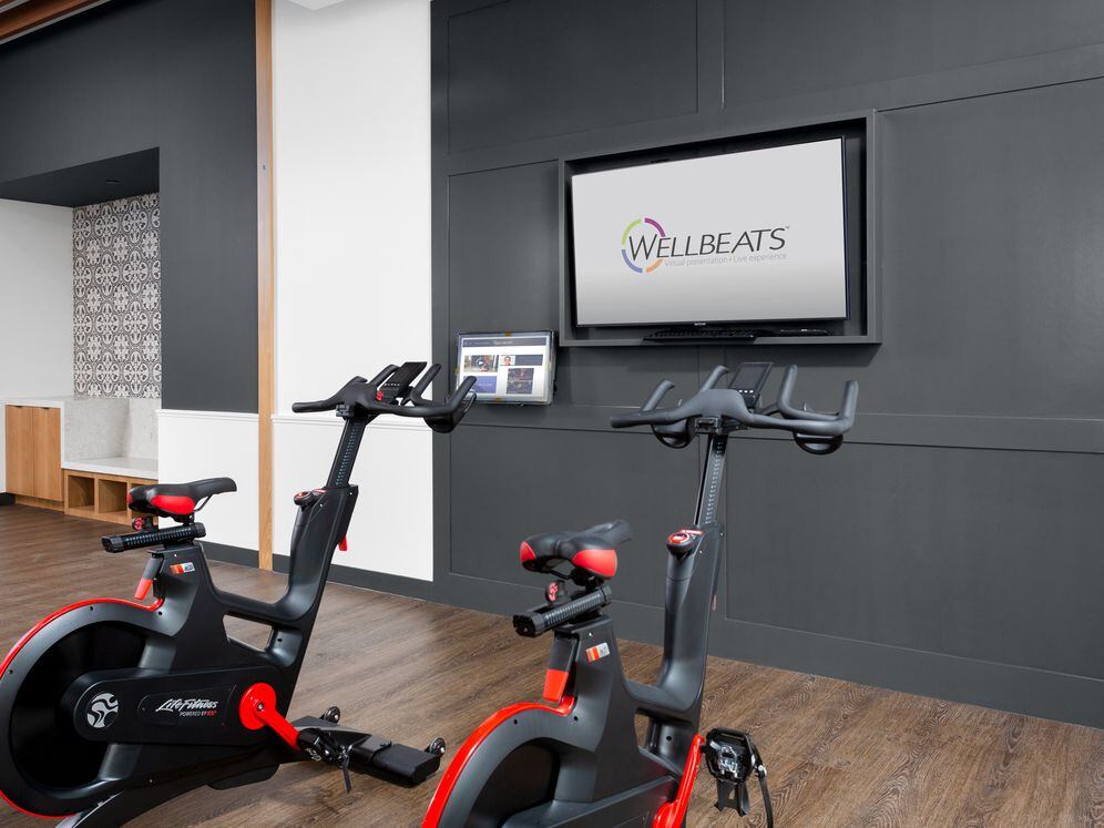 Fitness center with spin bikes and virtual fitness programming