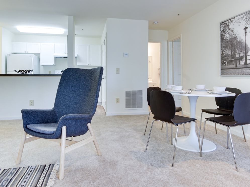 Carpeted living and dining area