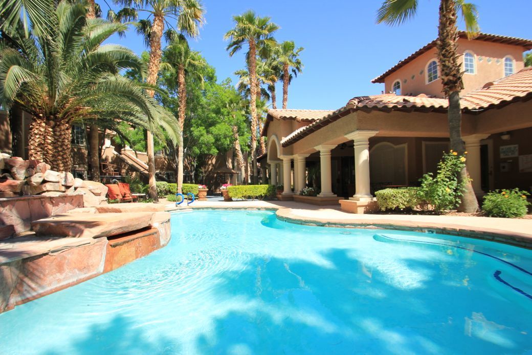 Resort Inspired Pool with Waterfall and Jacuzzi Spa