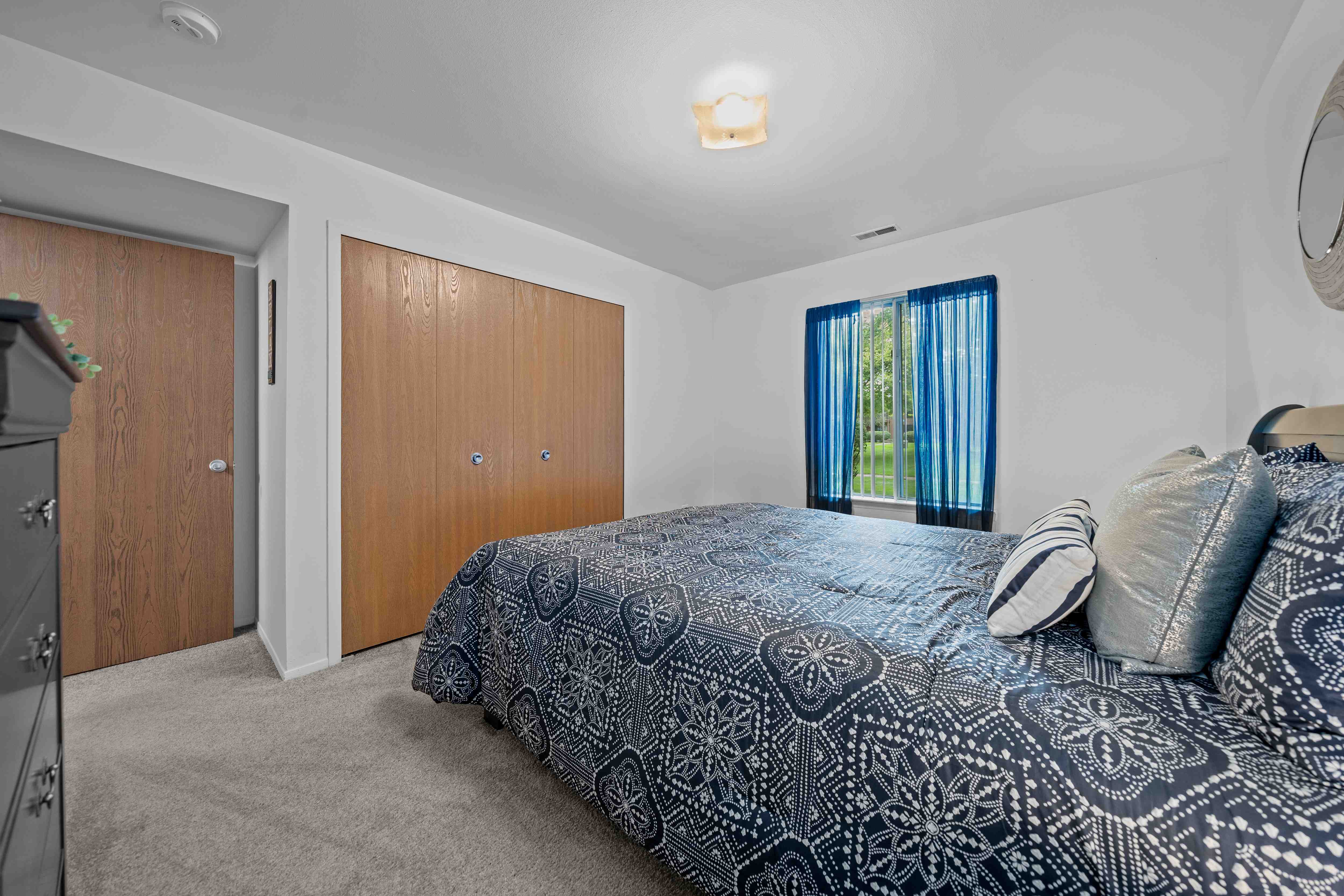 Spacious bedroom at Westwood Village Apartments in Westland, MI