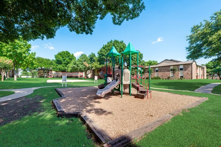 The Park at Wintergreen Apartments | DeSoto, TX | Playground and Jogging Path