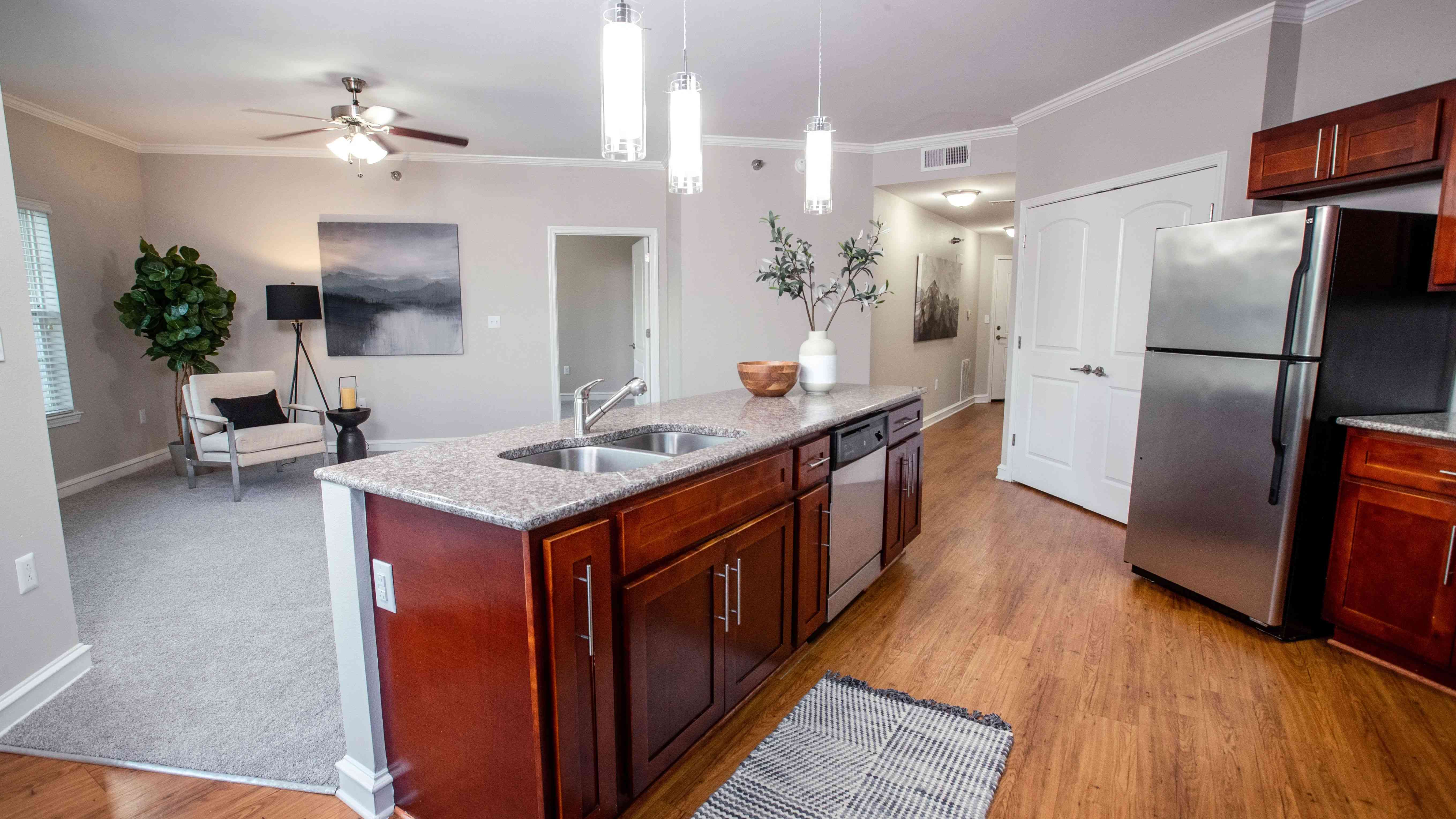 Revel in spacious living with our open-concept floor plans, filled with natural light from large windows, creating an inviting and serene atmosphere.