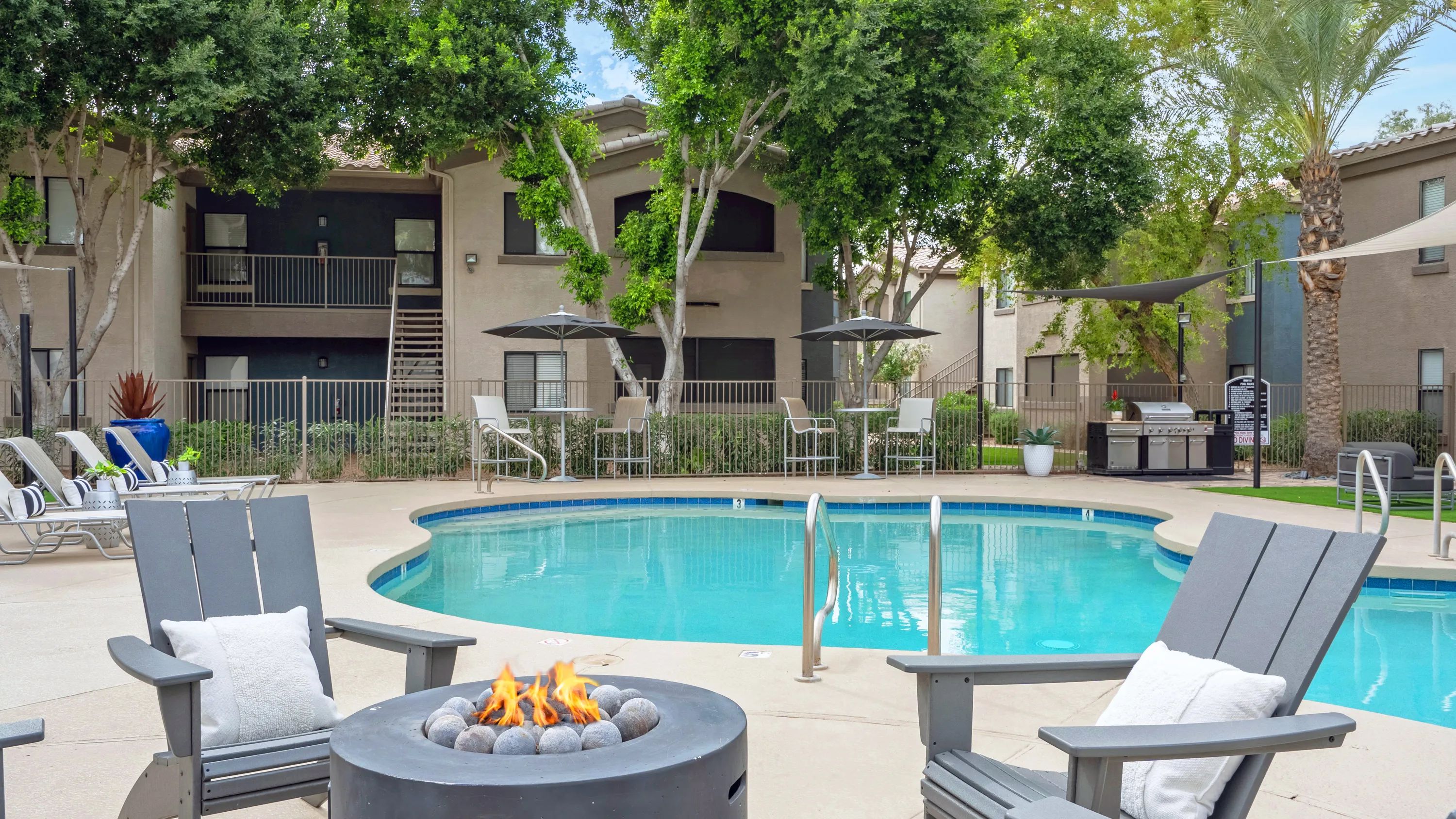 Unwind at the inviting community fire pit, where warmth and comfort combine. 