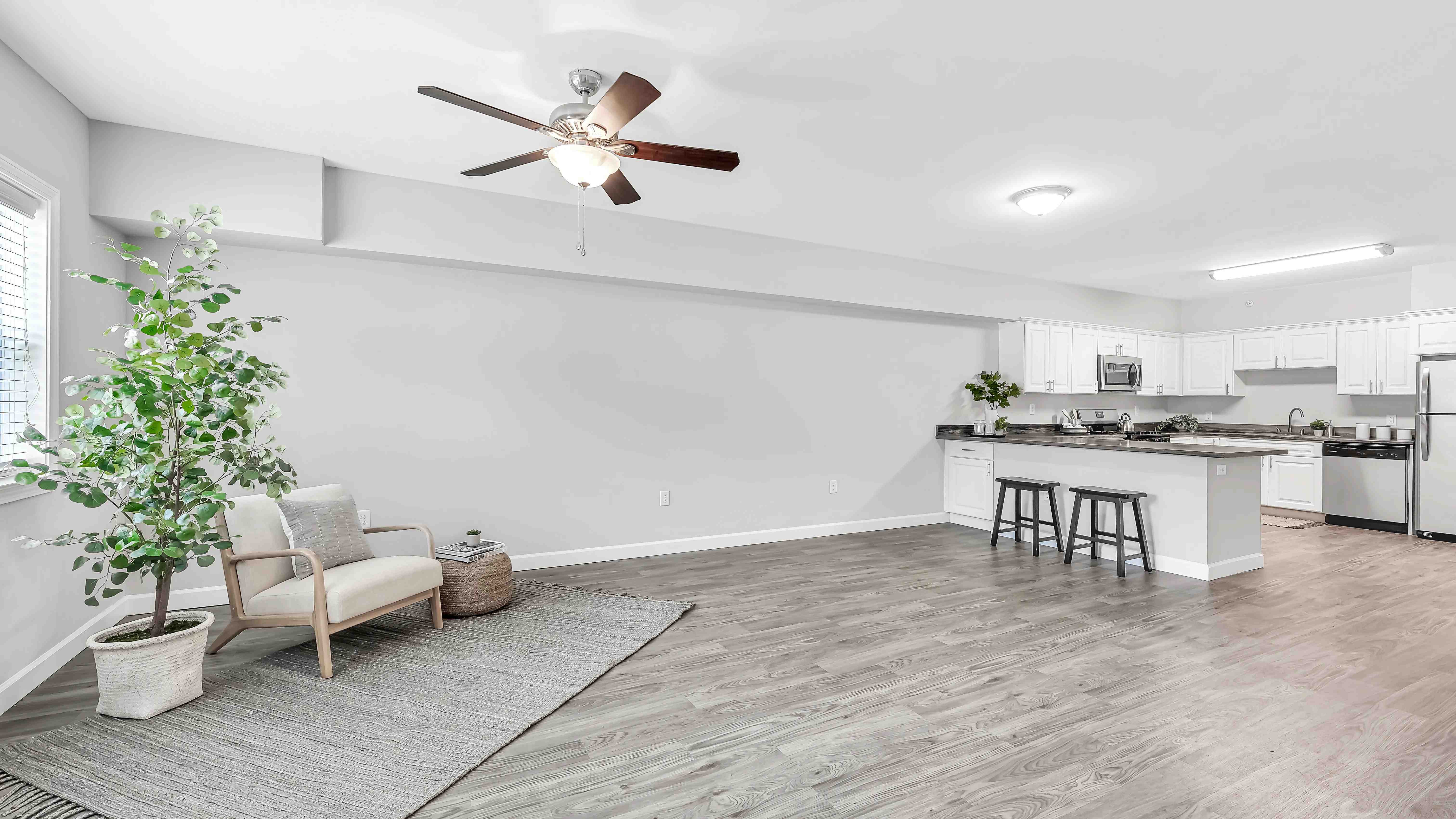 This open floor plan joins roommates together in style while giving everyone their own space to hang. Warm wood-like flooring, natural lighting, and an adjustable ceiling fan make it a college dream come true.