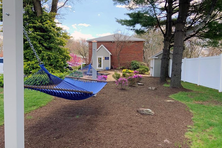 Relax after a long day at our hammock garden.