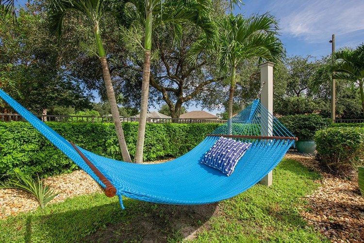 Chill out and dry off at our pool side hammock garden.