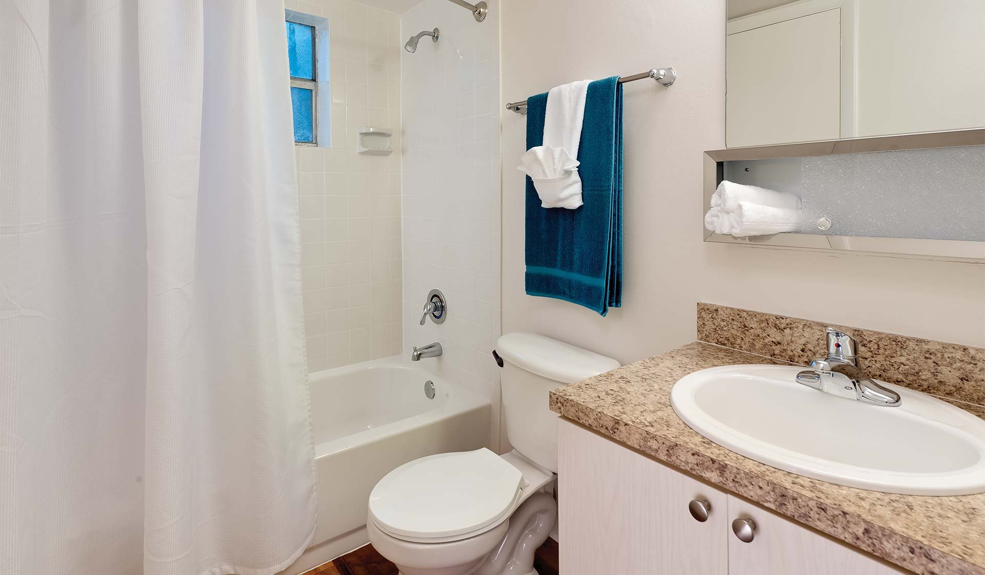 Standard bathroom with a separate vanity space