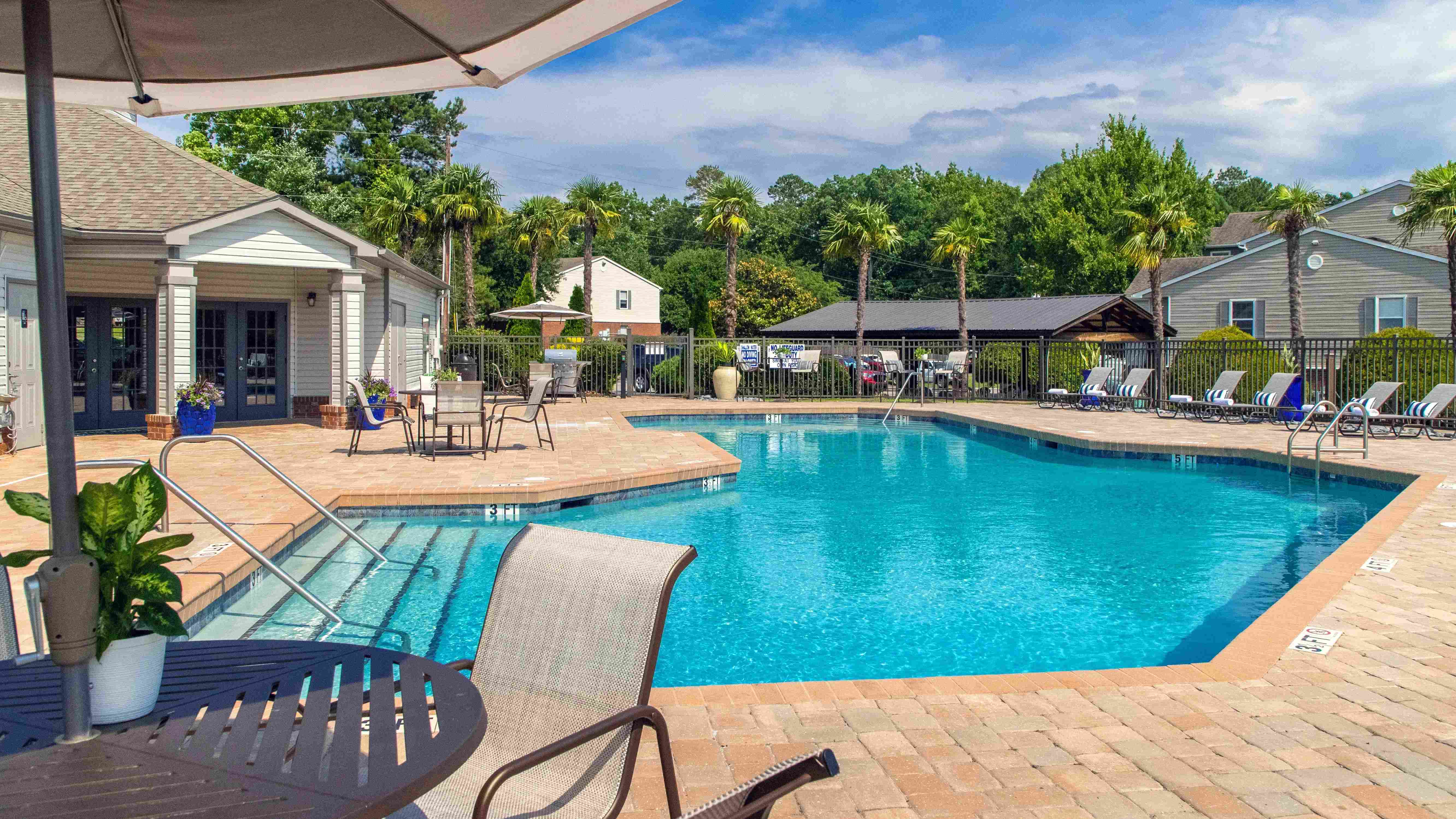 Plunge into our resort-style pool and bask on the expansive sundeck, inviting you to a day of poolside bliss. 
