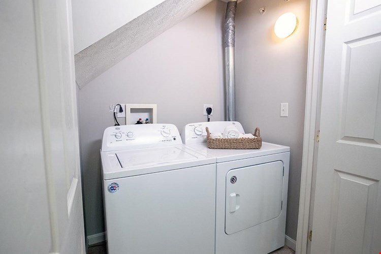 Full size washer and dryer appliances included.