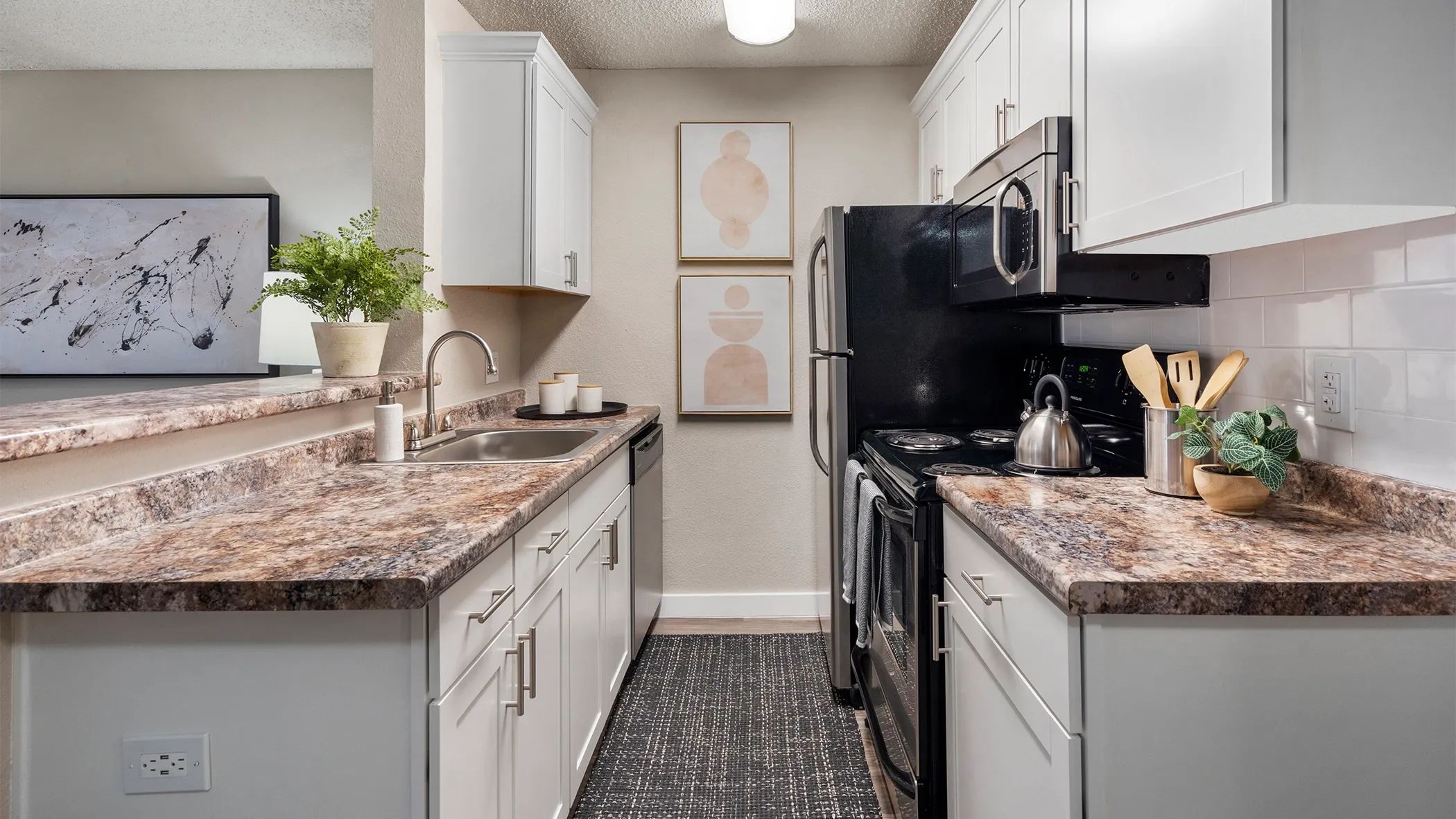 Our galley-style kitchens are designed for efficiency and convenience, with modern upgrades and stainless-steel appliances. 