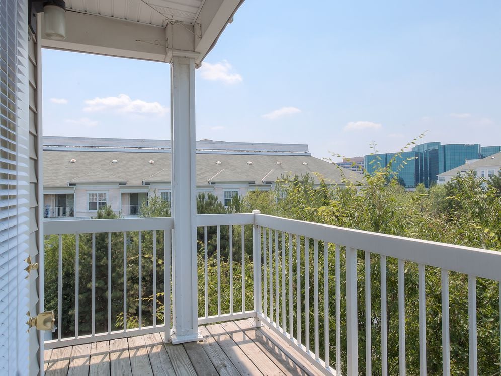 Private balcony with scenic wooded views
