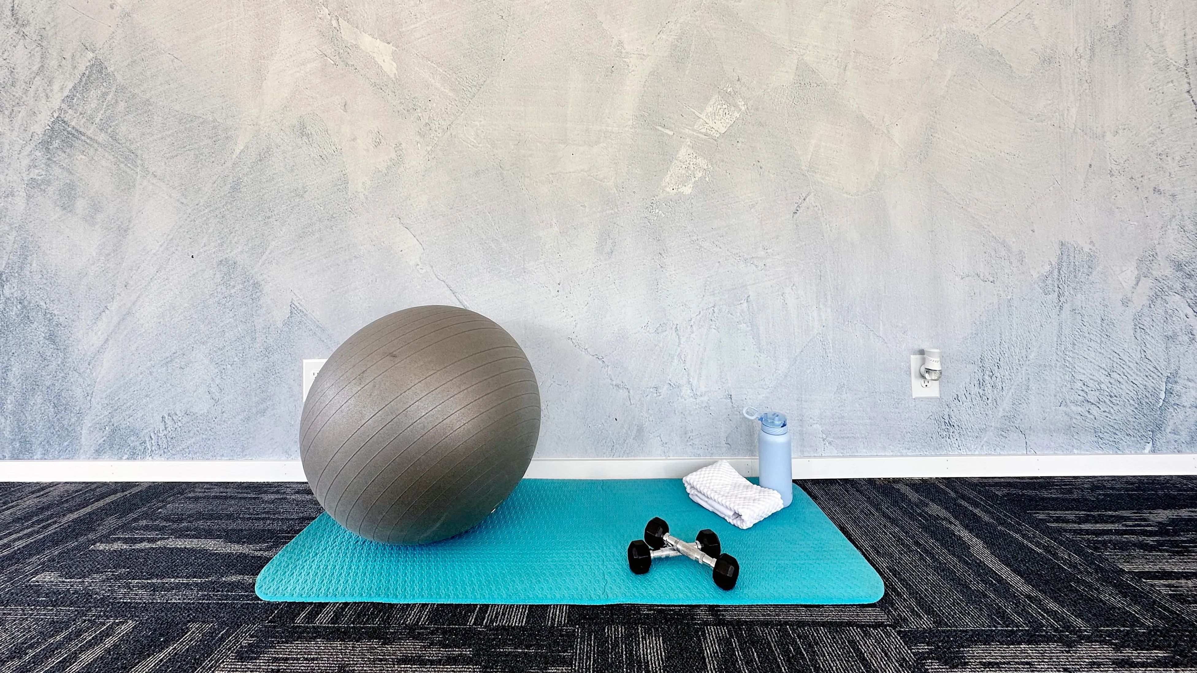 Unwind and energize in our 24-hour fitness center's dedicated yoga studio, offering a tranquil space for yoga practice. 