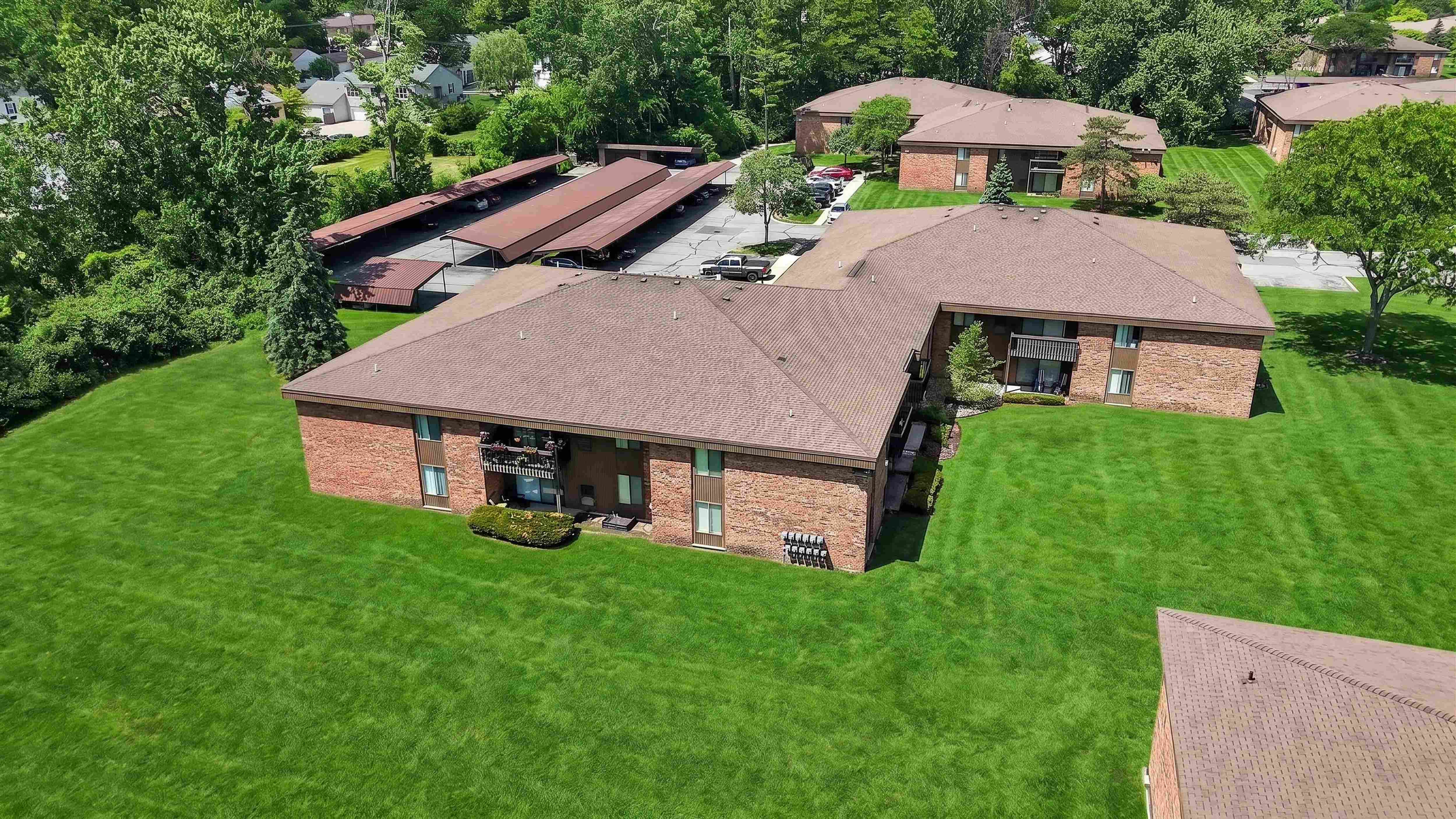 Expansive green space at Eastwood Village Apartments in Clinton Township, MI.