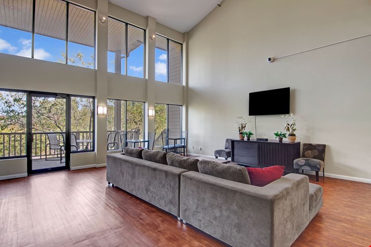 Town Centre Common Area with Outdoor View, Couch, and Television