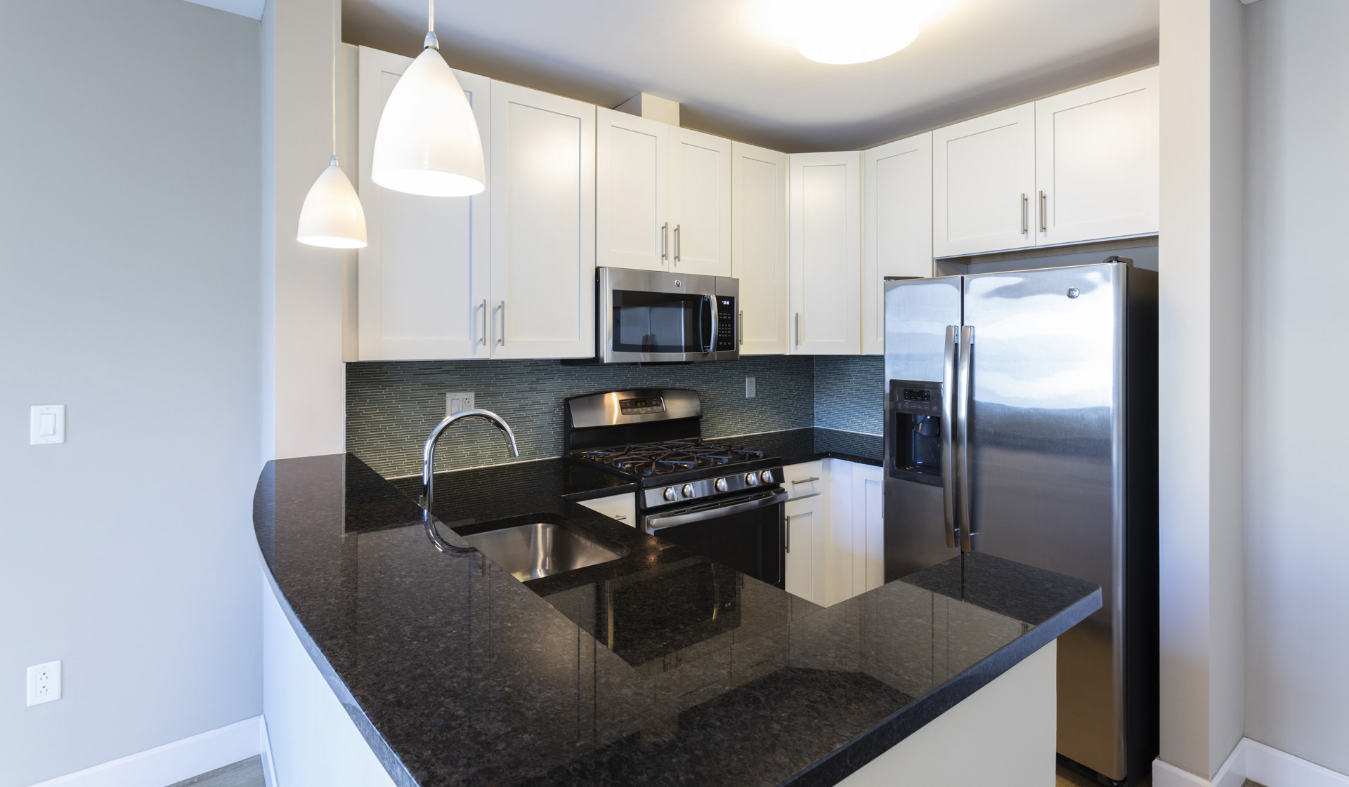 Enjoy cooking meals in kitchen with wood floors 