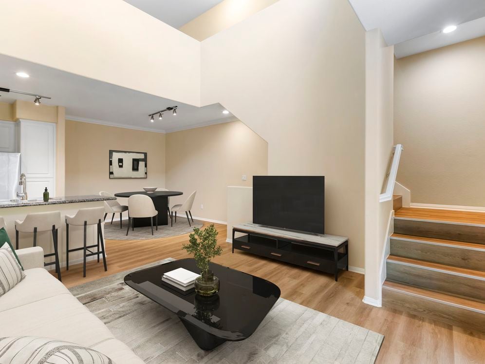 Renovated Package I living and dining room with hard surface flooring