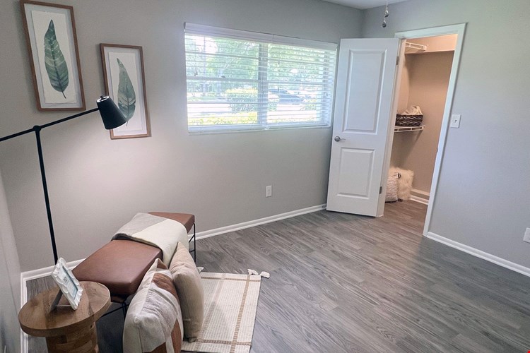 Spacious bedrooms featuring wood-style flooring, ample natural light, and a walk-in closet. This serene atmosphere is a perfect retreat for rest and relaxation.