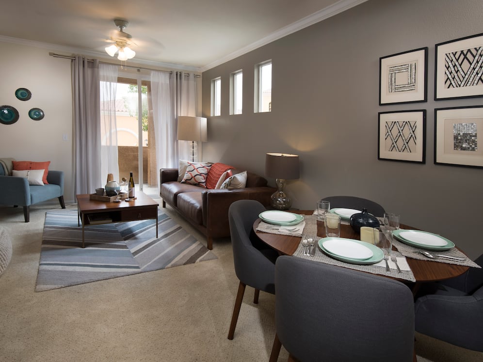 Classic Package I dining and living area with carpeting