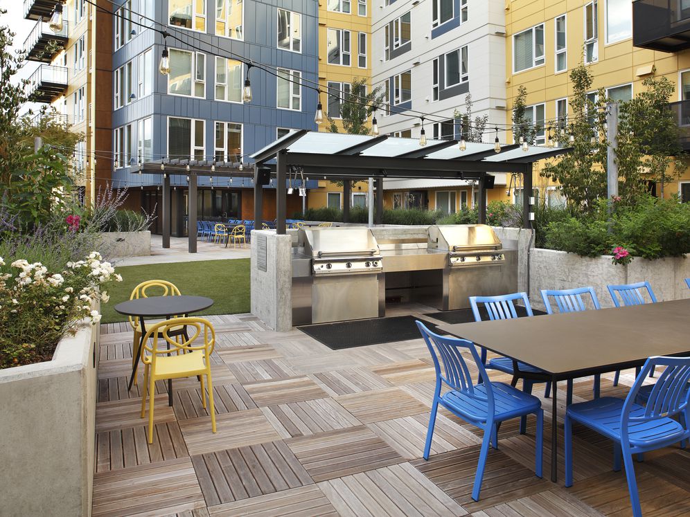 Outdoor lounge with BBQ grills