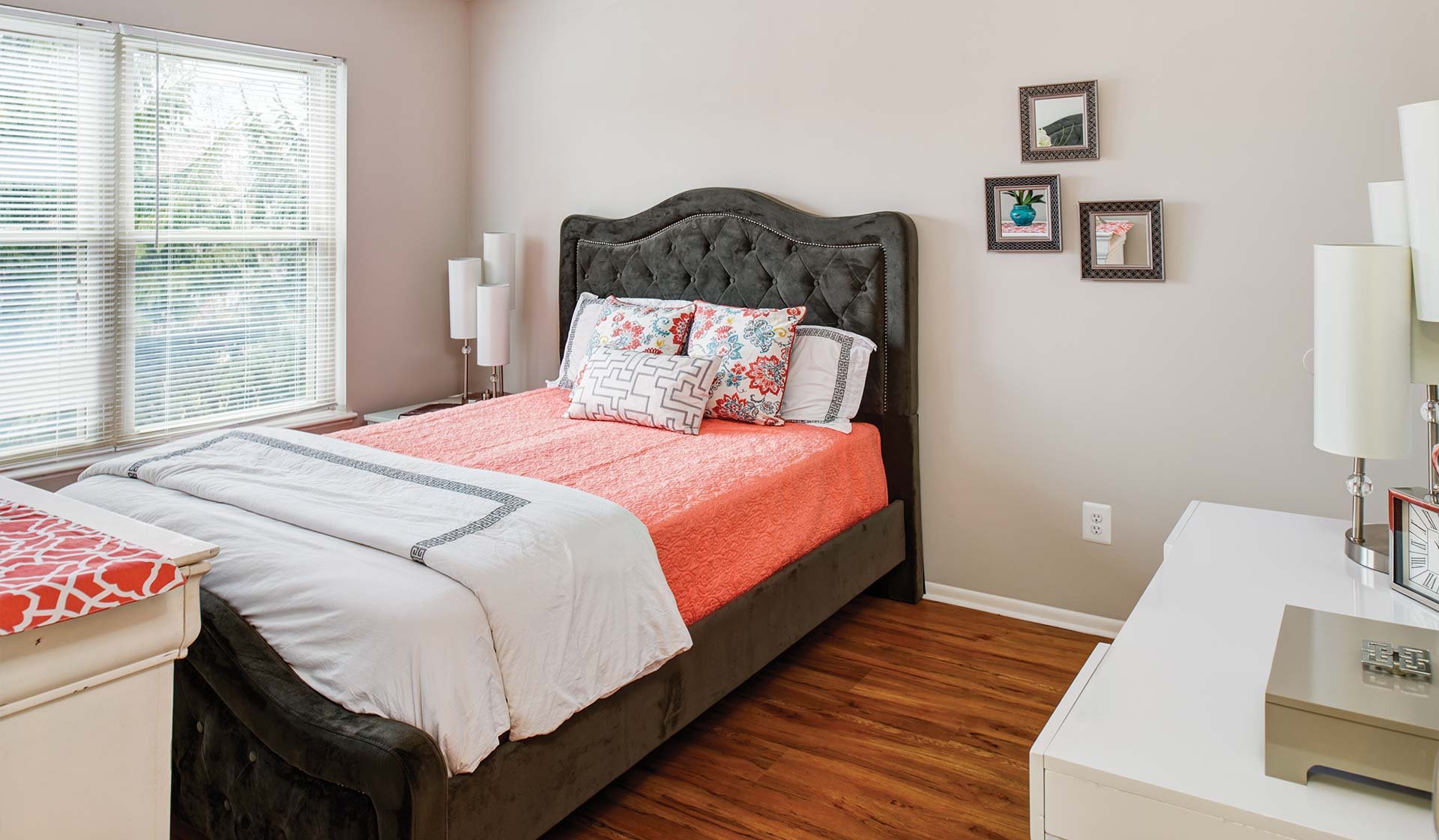 Laurel Pine Premier bedroom features wood flooring throughout