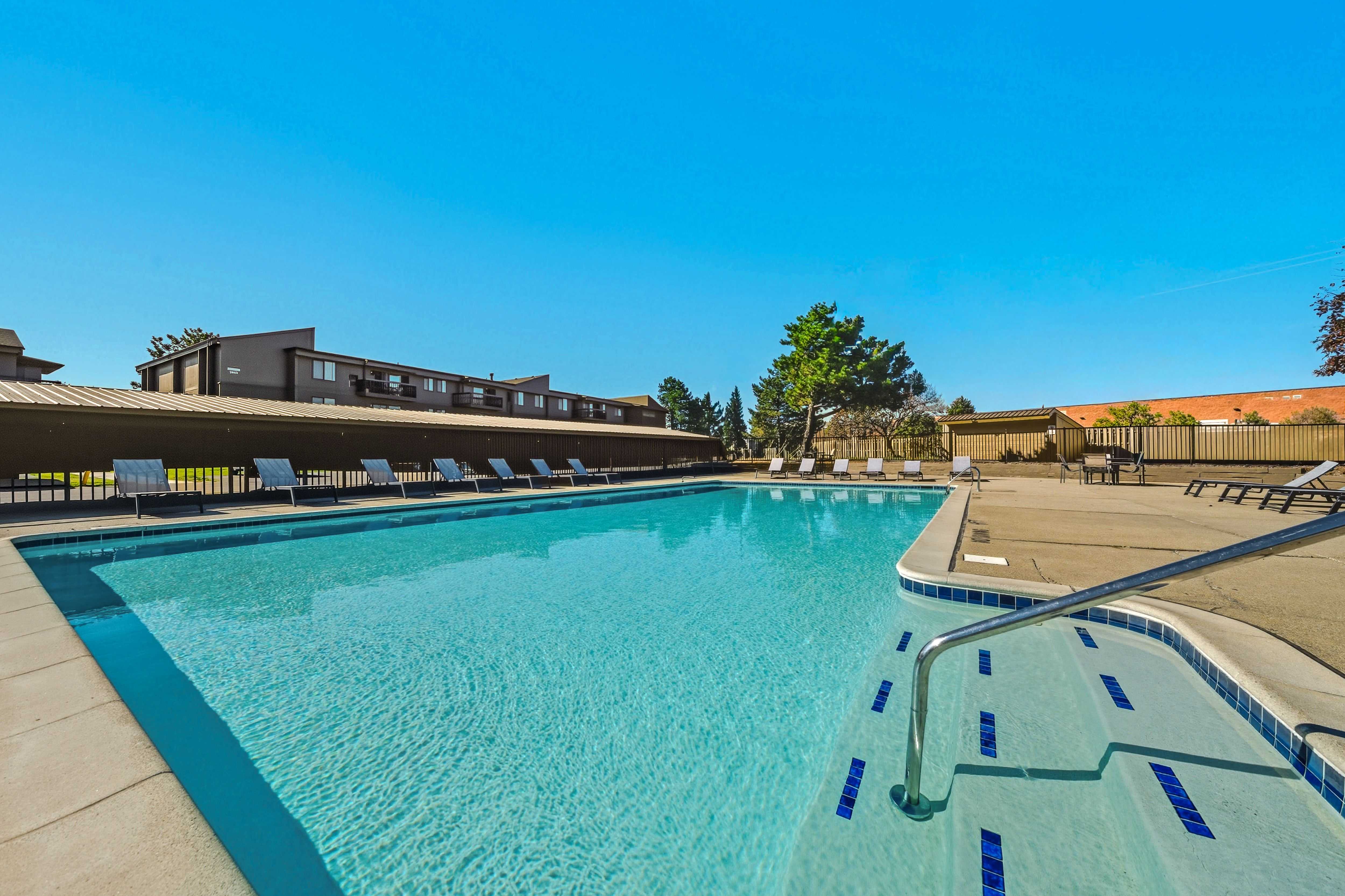 Sparkling Swimming Pool and Sun Deck at Franklin River Apartments in Southfield, MI