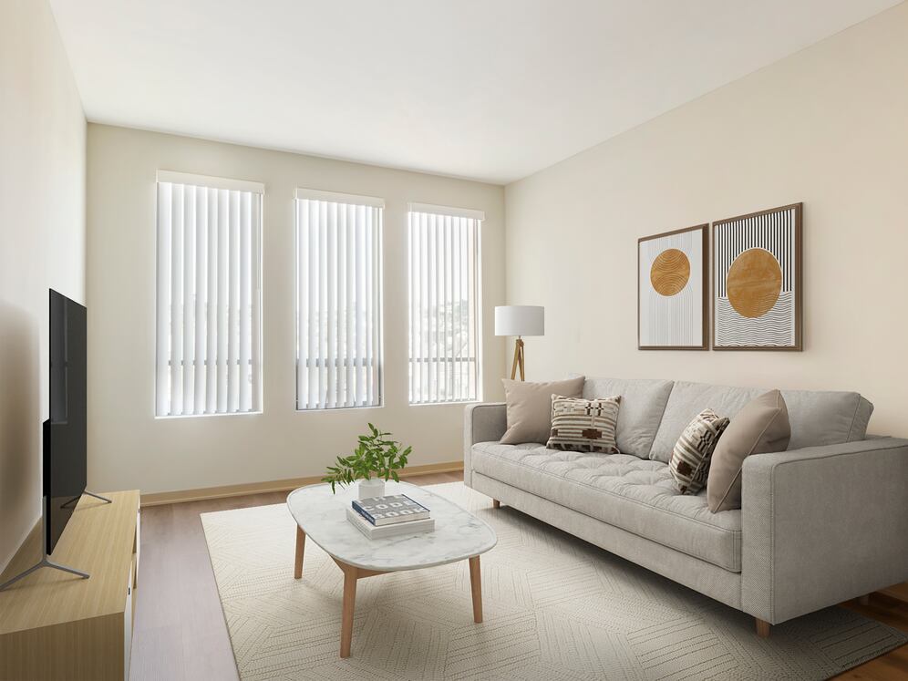 Renovated Package I living room with hard surface flooring