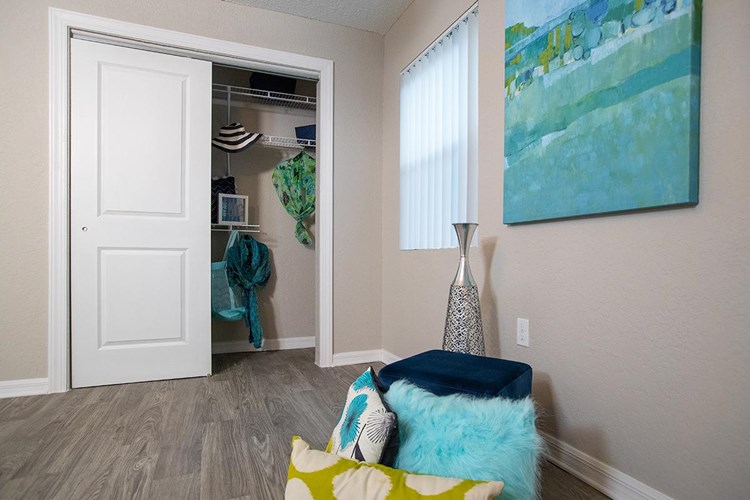 Bedrooms feature closets with built-in organizers for your convenience. 