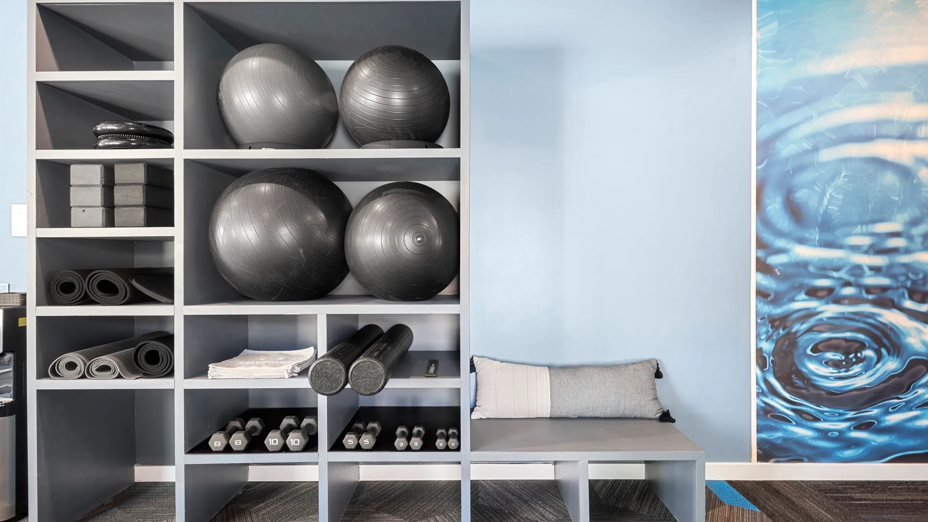 Our fitness center is fully stocked, complete with organized supplies for every need.