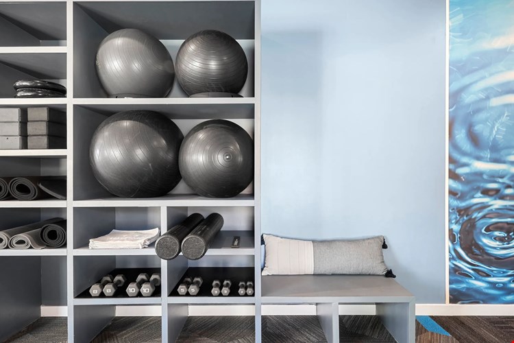 Our fitness center is fully stocked, complete with organized supplies for every need.