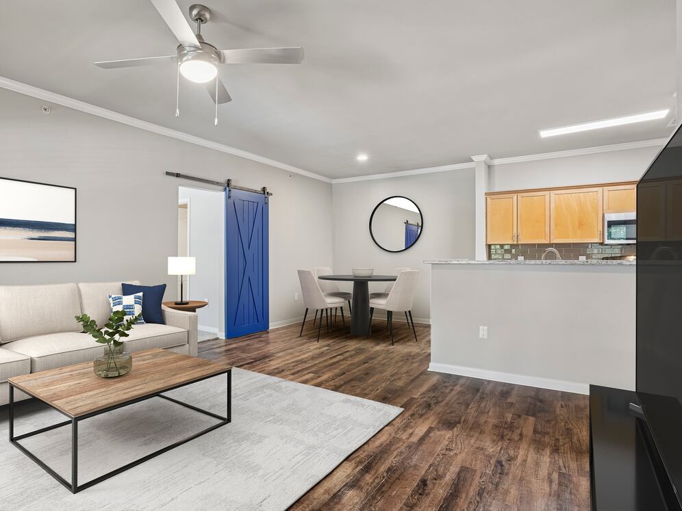 Kitchen, living, and dining area with hard surface flooring