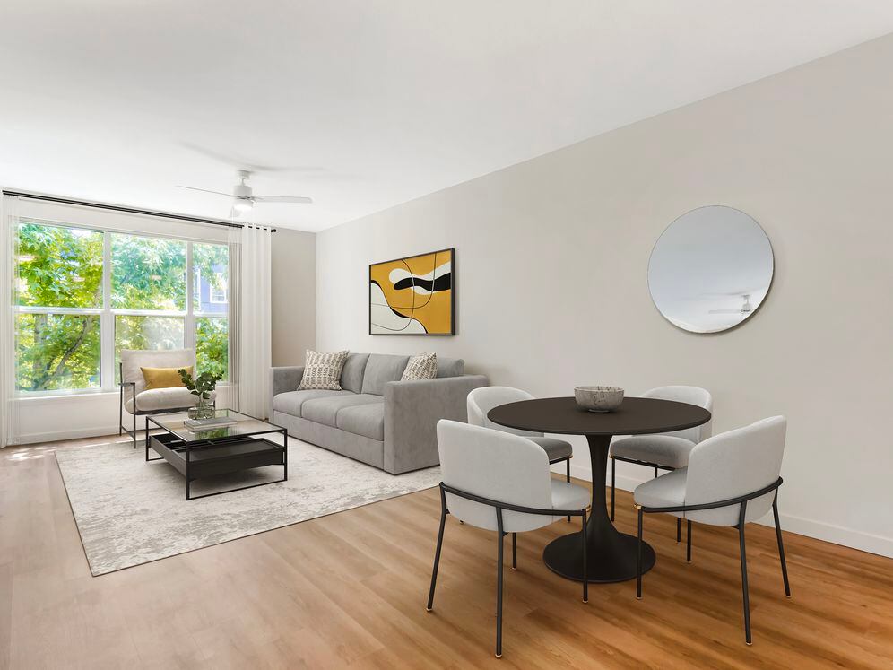 Renovated Package I dining and living room with hard surface flooring (in select homes)