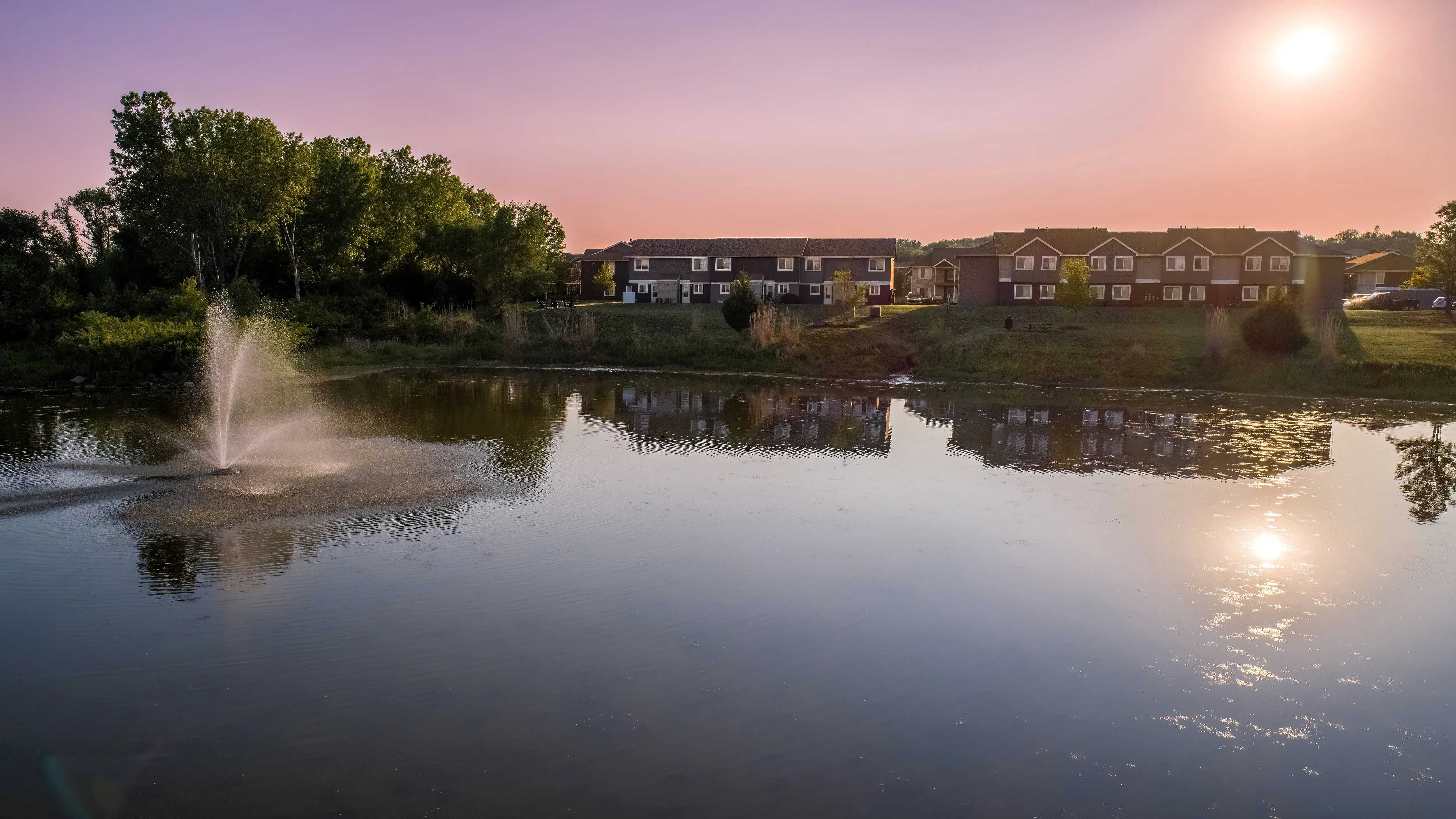 Immerse yourself in the enchanting beauty of our lake views at dusk beckoning you back home to Emory Lakes.