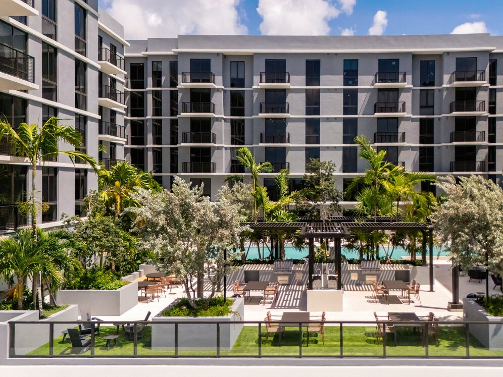 Outdoor lounge with resort-style pool, BBQ grills, and outdoor lounge 