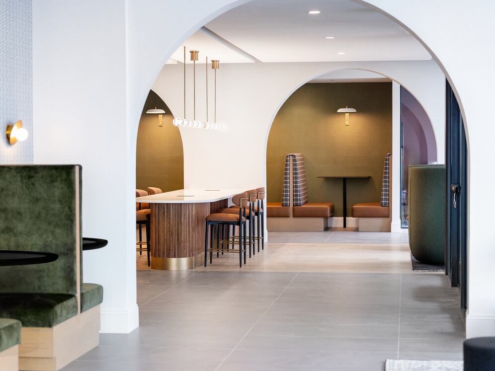 Building 100 Lobby and lounge with multiple seating areas