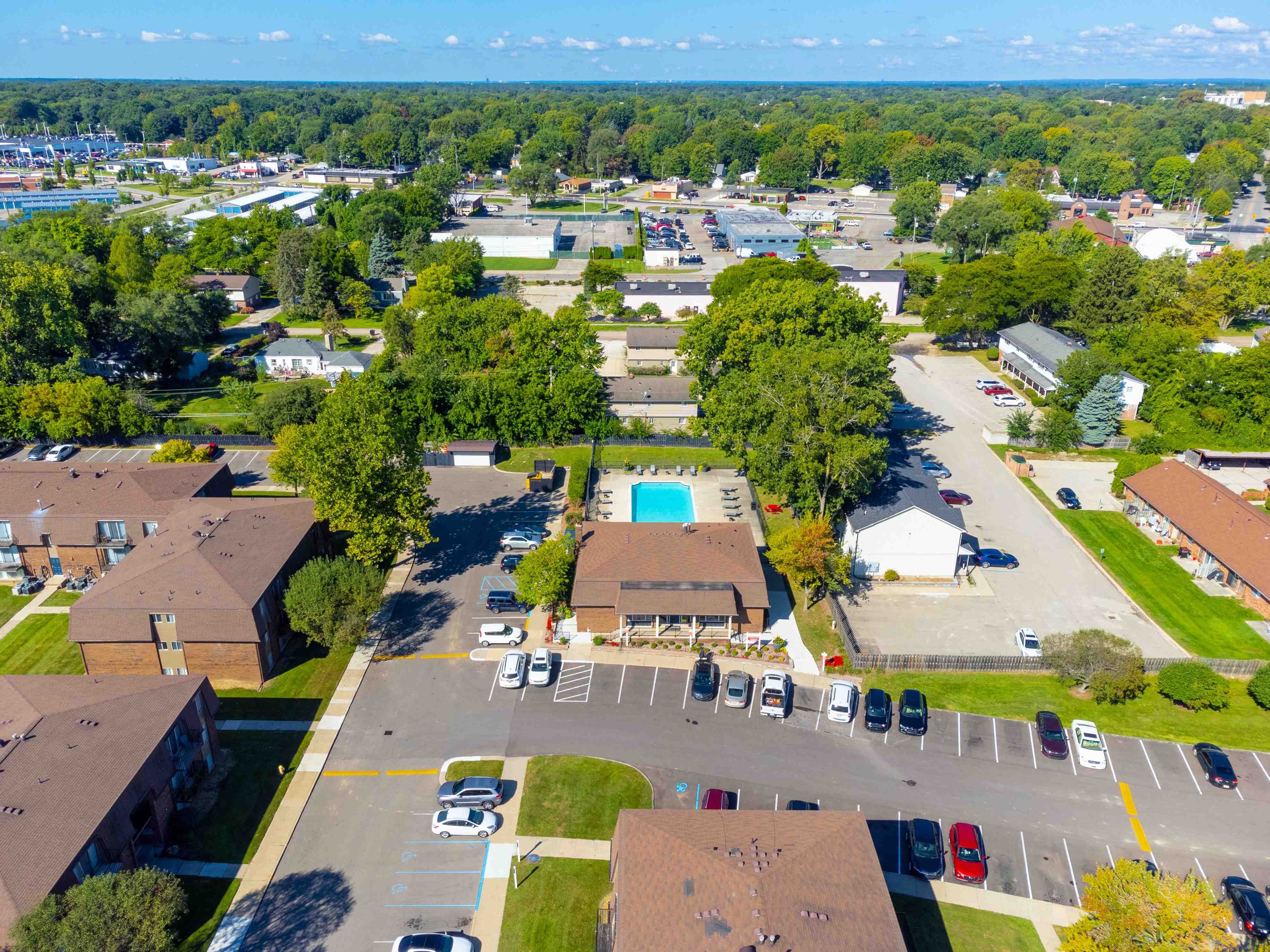 Aerial view with Pool at Knottingham Apartments in Clinton Township, MI