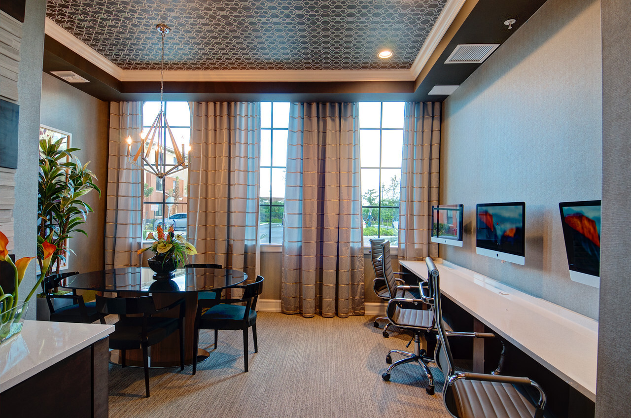 Business Center with the Latest iMacs and printer