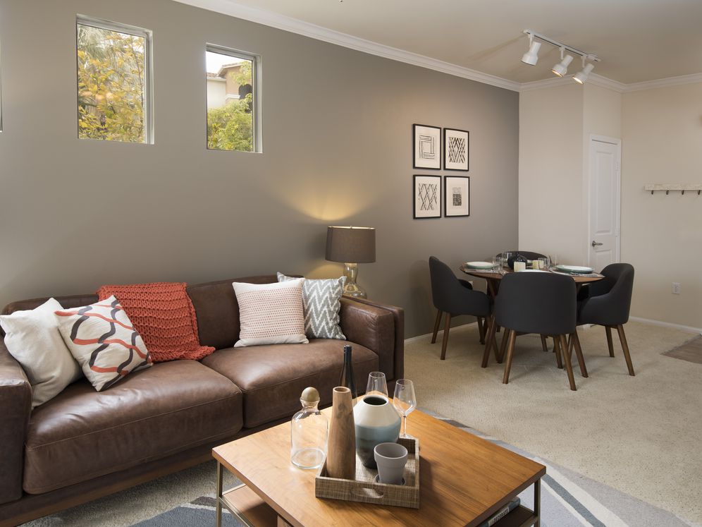 Classic Package I dining and living area with carpeting