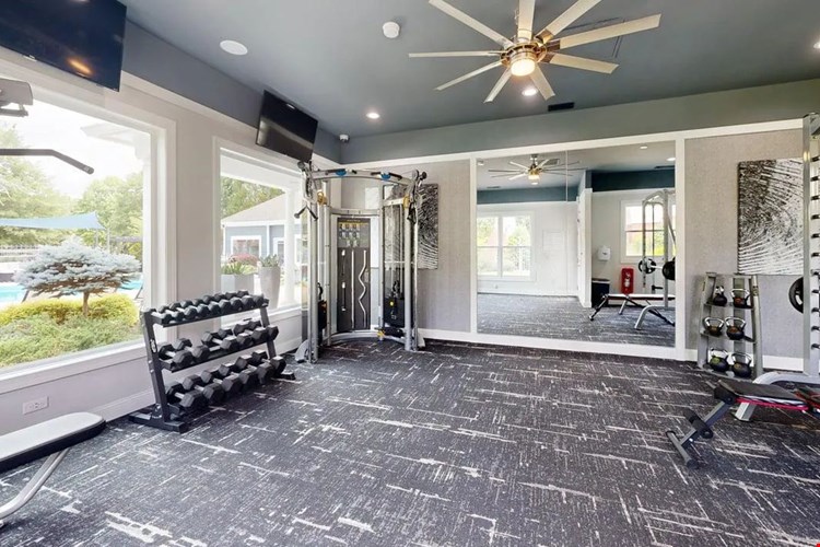 Focus on your fitness goals in our fully equipped weight room, complete with free weights, strength machines, and large windows for plenty of natural light.